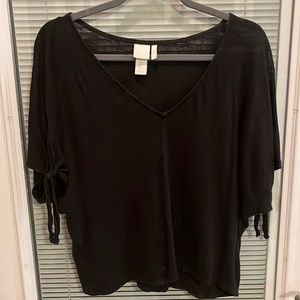 H&M size medium Black with 4 inch keyhole slits on the arm with dangling ties